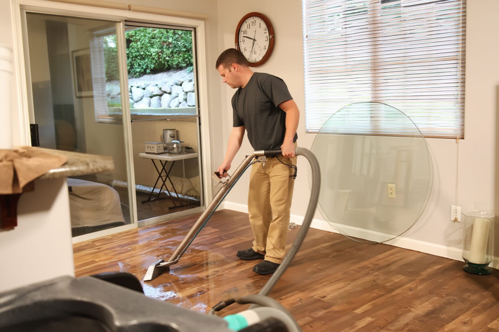 Emergency water extraction crew responding to nighttime water damage call in Austin home